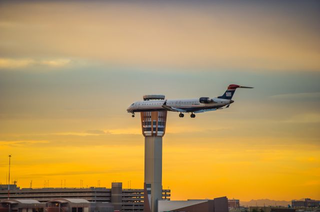 Canadair Regional Jet CRJ-700 (N929LR) - CRJ700 descending into Runway 25L at Phoenixs Sky Harbor Airport. I love the color of this sunset. ©Bo Ryan Photography | a rel=nofollow href=http://www.facebook.com/BoRyanPhotowww.facebook.com/BoRyanPhoto/a Please vote if you like the image!