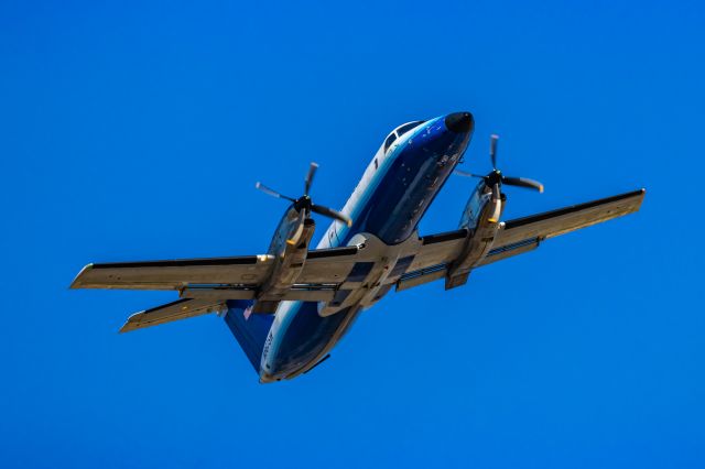 Embraer EMB-120 Brasilia (N567SW) - An Ameriflight EMB-120 Brasilia taking off from PHX on 3/4/23. Taken with a Canon R7 and Canon EF 100-400 L II lens.