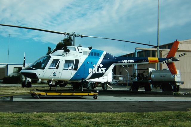 HELIBRAS VH-55 Esquilo (VH-PHX) - NSW POLICE SERVICE - AGUSTA A109A MK II - REG : VH-PHX (CN 5623) - KINGSFORD SMITH SYDNEY NSW. AUSTRALIA - YSSY - 28/6/1988 35MM SLIDE CONVERSION USING A LIGHTBOX AND A NIKON L810 DIGITAL CAMERA IN THE MACRO MODE