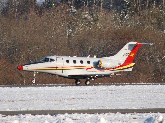 Beechcraft Premier 1 (N6JR) - Arriving on runway 02 at Concord Regional Airport - 3/2/09