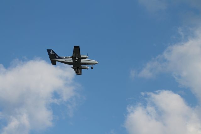 Cessna 402 (N121PB) - Another Cessna 402 landing on 22L at Logan.