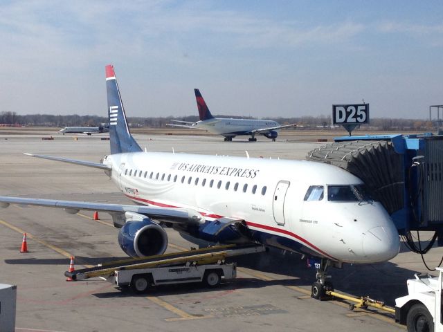 Embraer 170/175 (N137HQ) - A US Airways Express operated by Republic Airlines Embraer E170 N137HQ at Detroit International Airport (KDTW) on March 21, 2014.