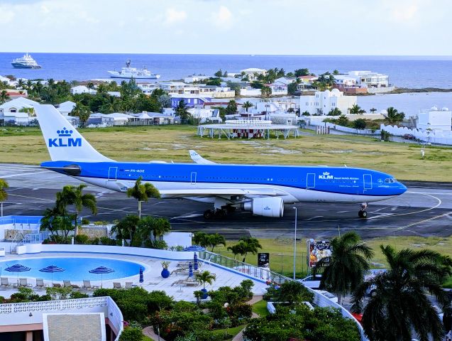 Airbus A330-200 (PH-AOE) - Back to AMS. Taken from the Sonesta Maho Beach Feb 20, 2024 with a Google Pixel 8. Enjoy!