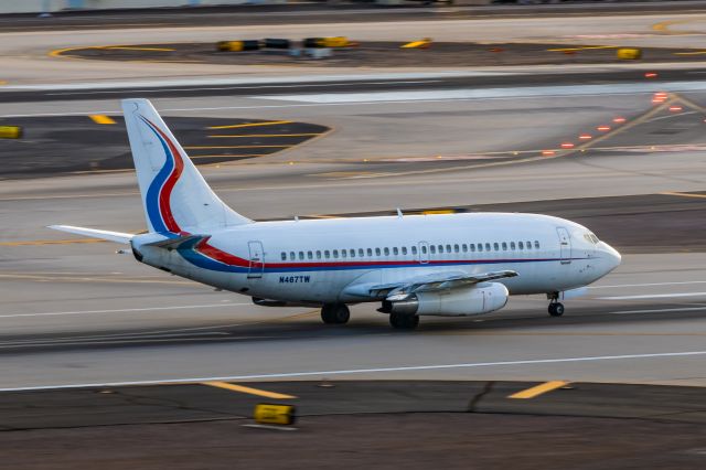 Boeing 737-200 (N467TW) - An Ameristar 737-200 taking off from PHX on 2/19/23. Taken with a Canon T7 and Tamron 70-200 G2 lens.