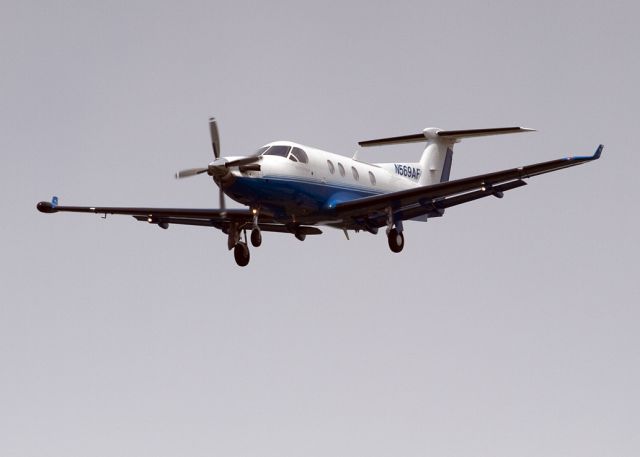 Pilatus PC-12 (N569AF) - Early afternoon approach to runway 18L Charlotte, North Carolina USA. Sunday, 8 May 2011