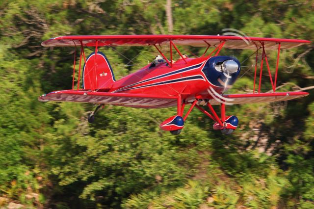 — — - I don't even know what this is but I see him around here all the time, GREAT little bi-plane at Spruce Creek Fly-In last Saturday! Gary