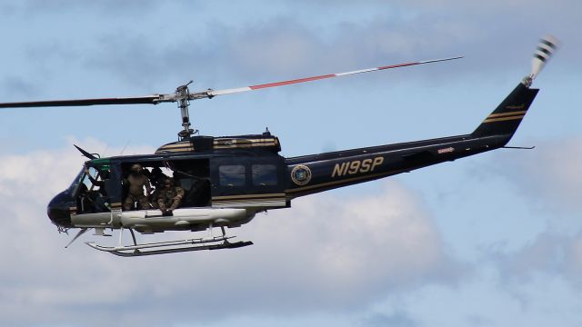 Bell UH-1V Iroquois (N19SP) - Performing a demonstration during the New York International Air Show, 24 August 2019.