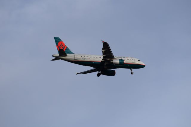 Airbus A319 (N838AW) - C/N 2615 America West Heritage livery final approach KMCO 27DEC15