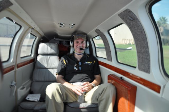 Beechcraft Baron (58) (N501CE) - Captain Jeff meets the back of Fifty Ice.  Nice back there, hug Jeff?  -F.O. SSS