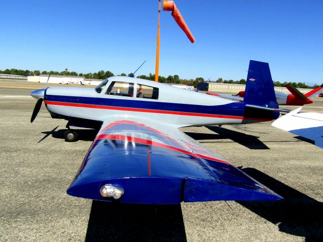 Mooney M-20 (N111MJ) - Parked on the ramp