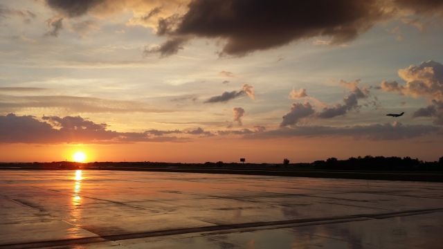 Cessna Citation CJ1 — - CJ1 taking off minutes after a storm passed. Taken with my phone in 2015.