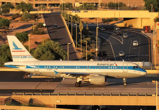 Airbus A319 (N744P) - Sunset