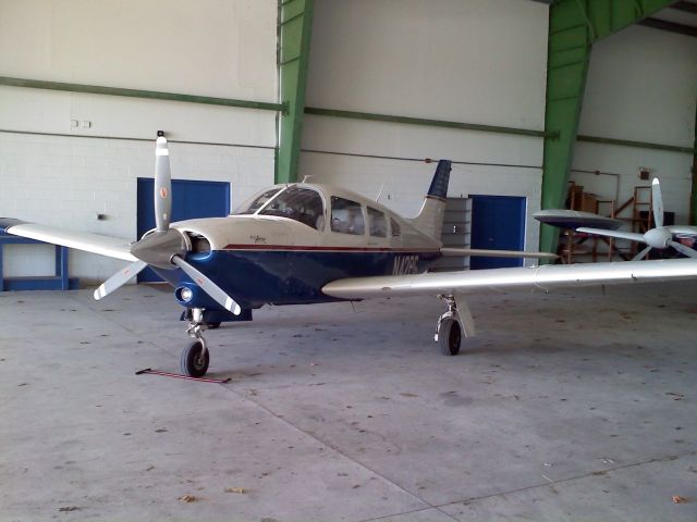 Piper Cherokee Arrow (N42PG) - Arrow III Turbo in FBO hangar @ Cape May