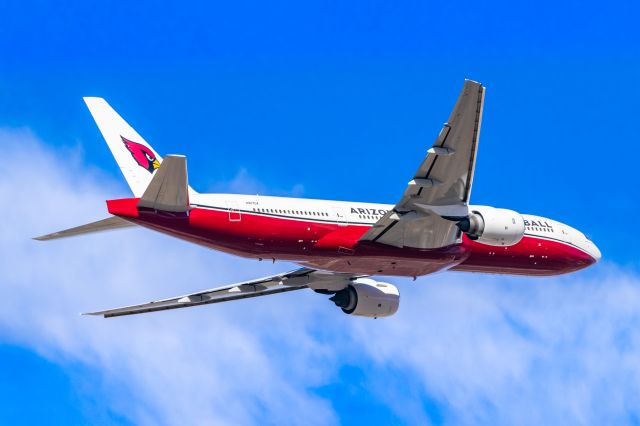 Boeing 777-200 (N867DA) - Arizona Cardinals 777-200 taking off from PHX on 11/22/22. Taken with a Canon 850D and Tamron 70-200 G2 lens.