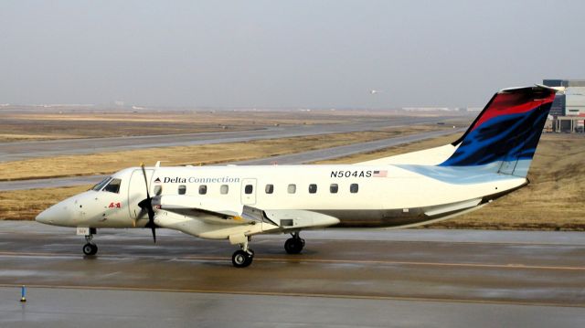 Embraer EMB-120 Brasilia (N504AS) - This photo was taken in 2002 when Delta still had a hub at DFW.