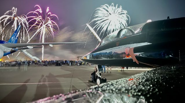 Northrop T-38 Talon (6413270) - The conclusion of EAA AirVenture 2022’s Night Show from the wing of a T-38A w/ Boeing’s ecoDemonstrator in the background. 7/27/22. br /br /The aircraft in the background is a 2002 Boeing 777-200(ER), S/N 32336. The aircraft the photo is being taken from is a 1994 Northrop T-38A Talon of the 1st Reconnaissance Wing at Beale AFB, CA.