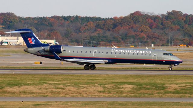 Canadair Challenger (N505MJ) - Slowing to turn off runway 20R in November 2006