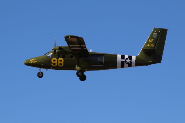 De Havilland Canada Twin Otter (77-0465) - UV-18B rocking its wing goodbye to the crowd.