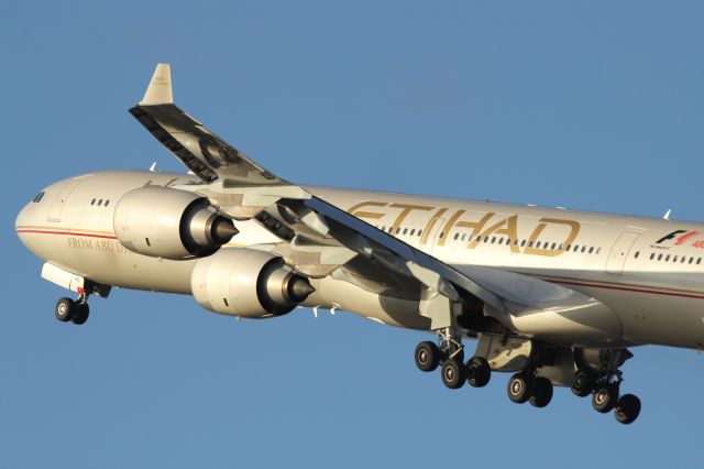 Airbus A340-600 — - Departing runway 027L at LHR.