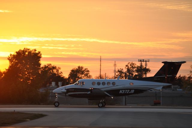 Beechcraft Super King Air 350 (N372JB) - After the missing man formation flight for Frank Hailes memorial at ADS N372JB landed providing this breathtakingly beautiful picture. 