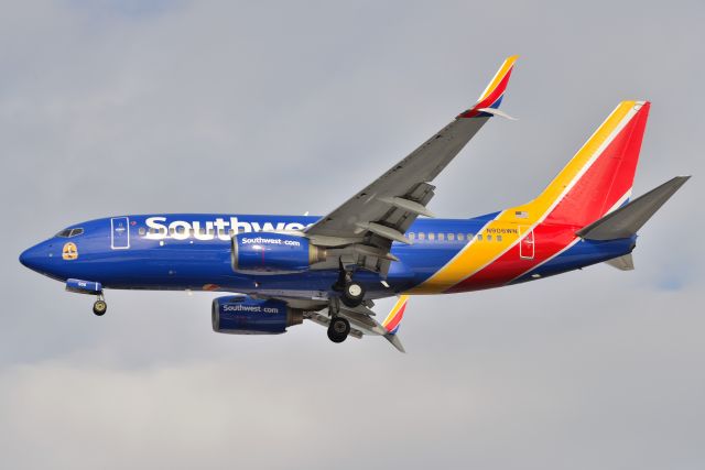 Boeing 737-700 (N906WN) - 23-L 02-14-2022. First Pic of this bird in the new SWA colors and new colorized sticker on the data-base.