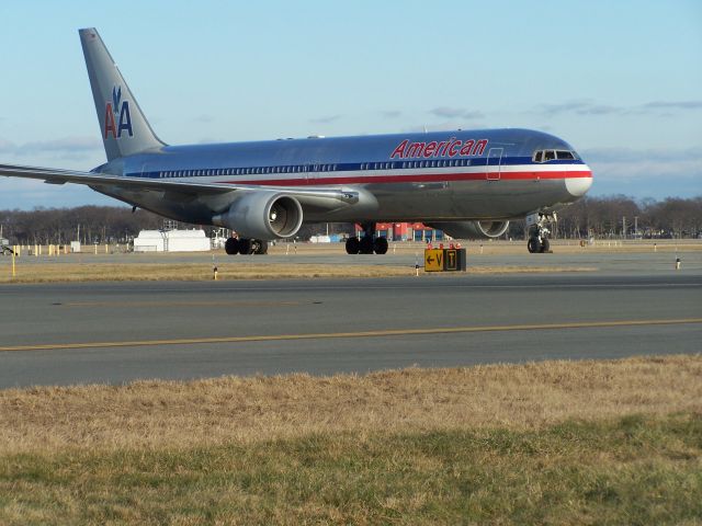 BOEING 767-300 (N351AA) - N351AA sits on the southern end of taxiway victor at TF Green Providence on Saturday 24th December. It had arrived from Fort Lauderdale on Friday 23rd with the Miami Dolphins, and returned the team home after their game with the New England Patriots!