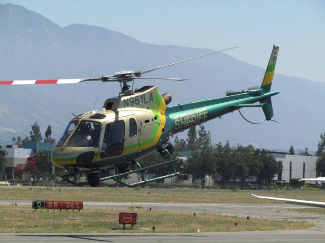 Eurocopter AS-350 AStar (N961LA) - Lifting off from KPOC