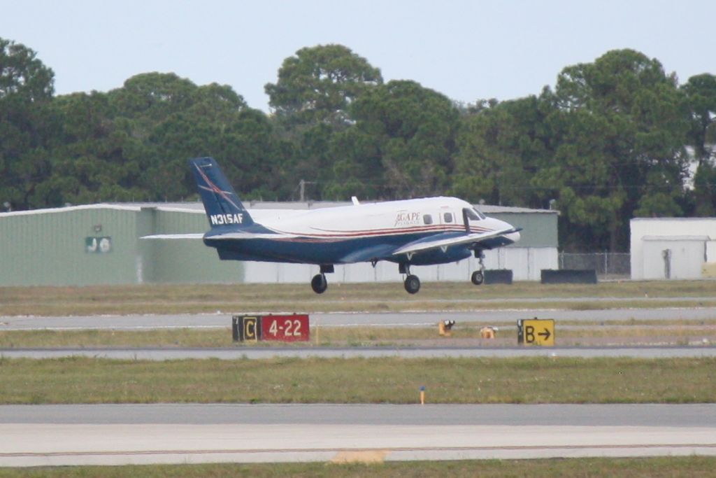 Embraer EMB-110 Bandeirante (N316AF) - Agape Flights (N316AF) arrives on Runway 4 at Sarasota-Bradenton International Airport following a flight from La Isabela International Airport