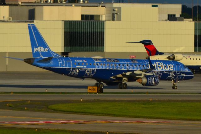 Embraer ERJ-190 (N304JB) - "Blueprint" waiting for a gate to open at the new Concourse-A at KCLT - 8/3/18