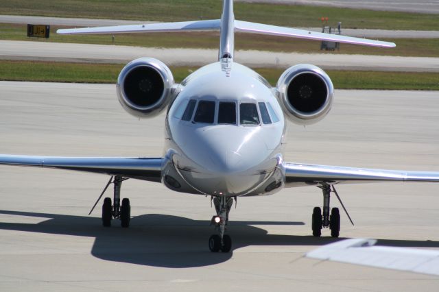 Dassault Falcon 2000 (N227QS) - 227QS lining up in its parking spot at Landmark at RDU