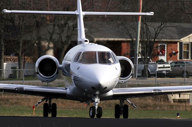 Hawker 800 (N897A) - This pic shows how close some of the houses are to the runway at Lebanon, Tennessee (M54).