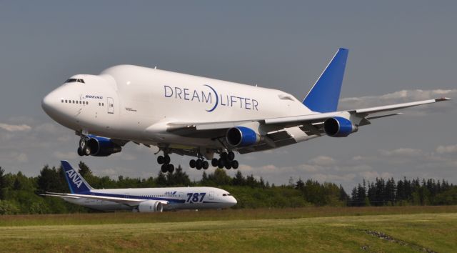 Boeing 747-400 (N747BC) - Dreamlifter N747BC arriving at Paine Field while ANA 787-8 N1015X (temp reg) awaiting depature clearance