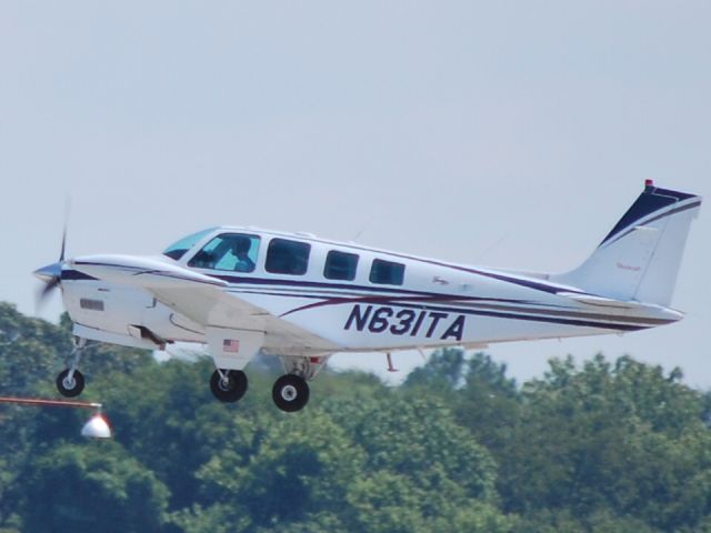 Beechcraft Bonanza (36) (N631TA) - Departing Runway 2L - 8/23/09