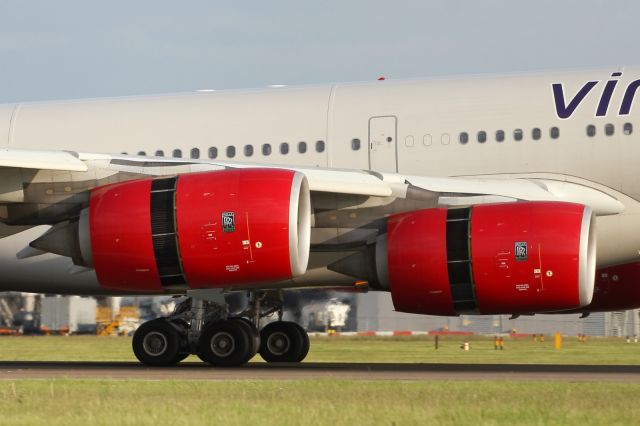 Airbus A340-600 — - Thrust reversers deploy on the Rolls Royce Trent 500 on a Virgin A340-600.