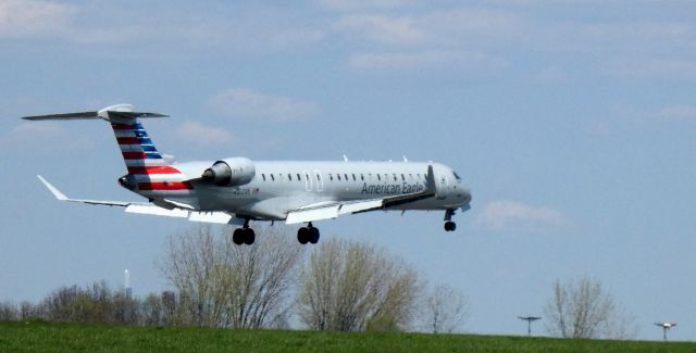 Canadair Regional Jet CRJ-900 (N558NN) - About to touch down is this 2014 American Airlines Eagle Canadair Regional Jet 900LR in the Spring of 2023.
