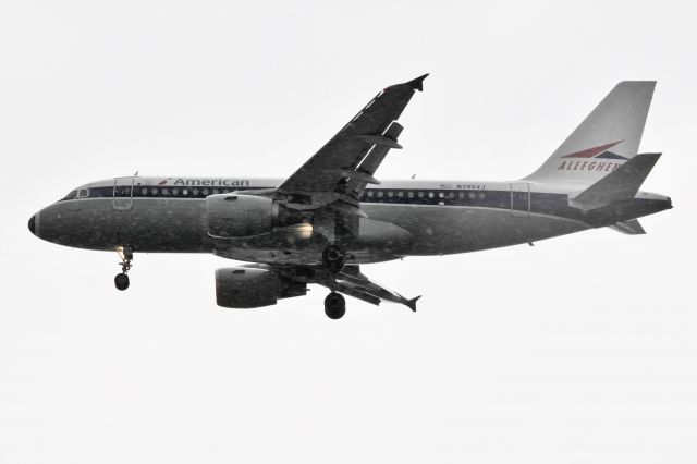 Airbus A319 (N745VJ) - Arriving in the middle of a passing snow pellet squall. Those things sting!