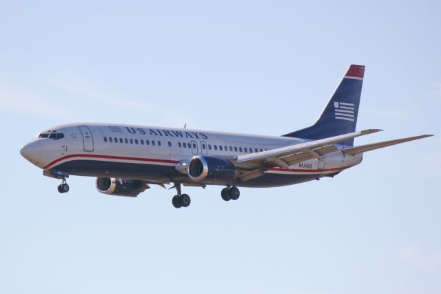 BOEING 737-400 (N434US) - US Air Flight 1989 (N434US) on approach to Runway 6 at Southwest Florida International Airport following a flight from Charlotte/Douglas International Airport