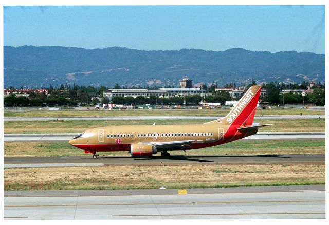 Boeing 737-500 (N510SW) - KSJC - July 2004 with Southwest 737-5 headed to 30L for departure.br /br /Serial number 24187 LN:1940 br /Type 737-5H4br /First flight date 16/10/1990