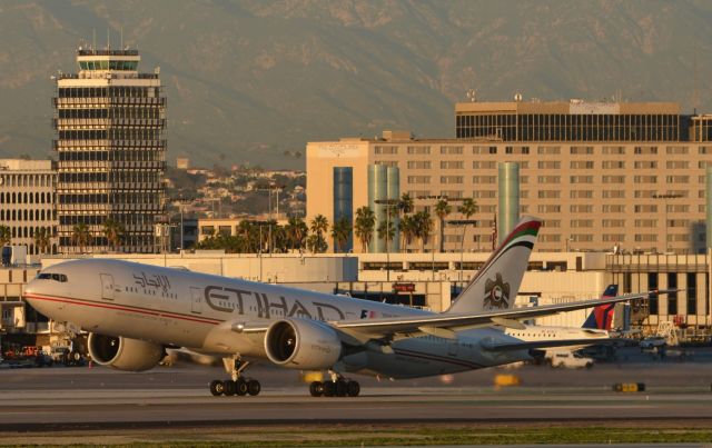 BOEING 777-200LR (A6-LRD) - Sunset takeoff from RWY 25R