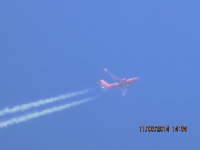 Boeing 737-700 (N266WN) - Southwest Airlines flight 805 from PHX to CLE over Southeastern Kansas at 39,000 feet.