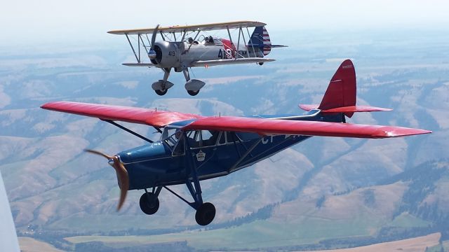 — — - N4760V (450 Stearman) and N223EC (DeHavilland Puss Moth) formation flight