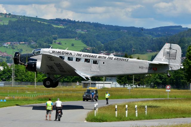 JUNKERS Ju-52/3m (HB-HOP) - HB-HOP, JU-52/3m g4ebr /Buildt 1939 in Dessau, Germany. Used from 1939 until 1981 as flying classroom for the swiss army "Fliegertruppe" as No. A-703br /Since 1982 member of Ju-Air, a company driven by volunteers. Here seen before touch down. The runway ist too short to let pass some people...