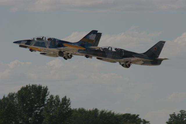 Aero L-39 Albatros — - L-39 Albatrosses depart Runway 18 Oshkosh during Jet Day EAA