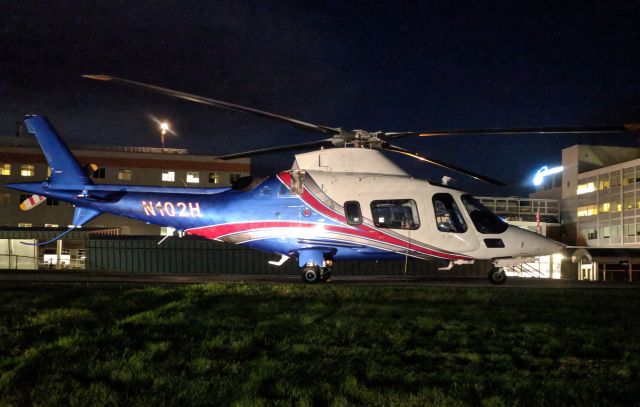 SABCA A-109 (N102H) - N102H (2009 AgustaWestland AW109E Power, C/N 11781) rests on the helipad at night at Central Maine Medical Center (ME95) in Lewiston, Maine. Photo date: Monday October 22, 2018, 6:39 PM