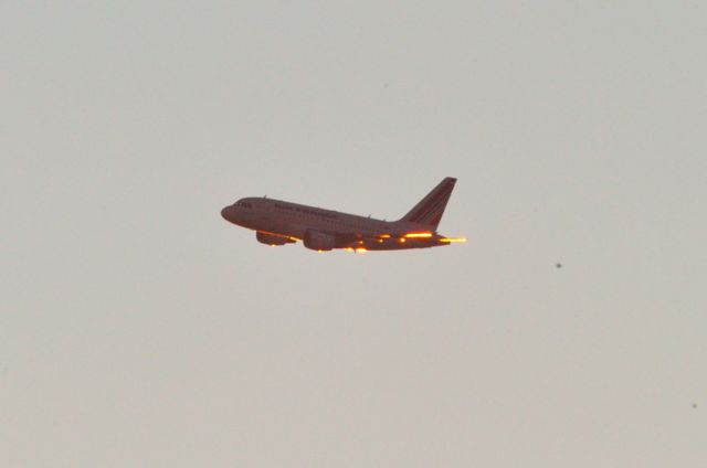 Airbus A318 (F-GUGA) - Landing at Sunrise