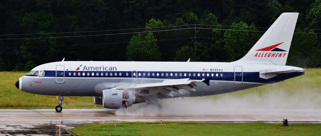 Airbus A319 (N745VJ) - Allegheny retrojet making an appearance at RDU after quite the downpour.  On 5/17/18.