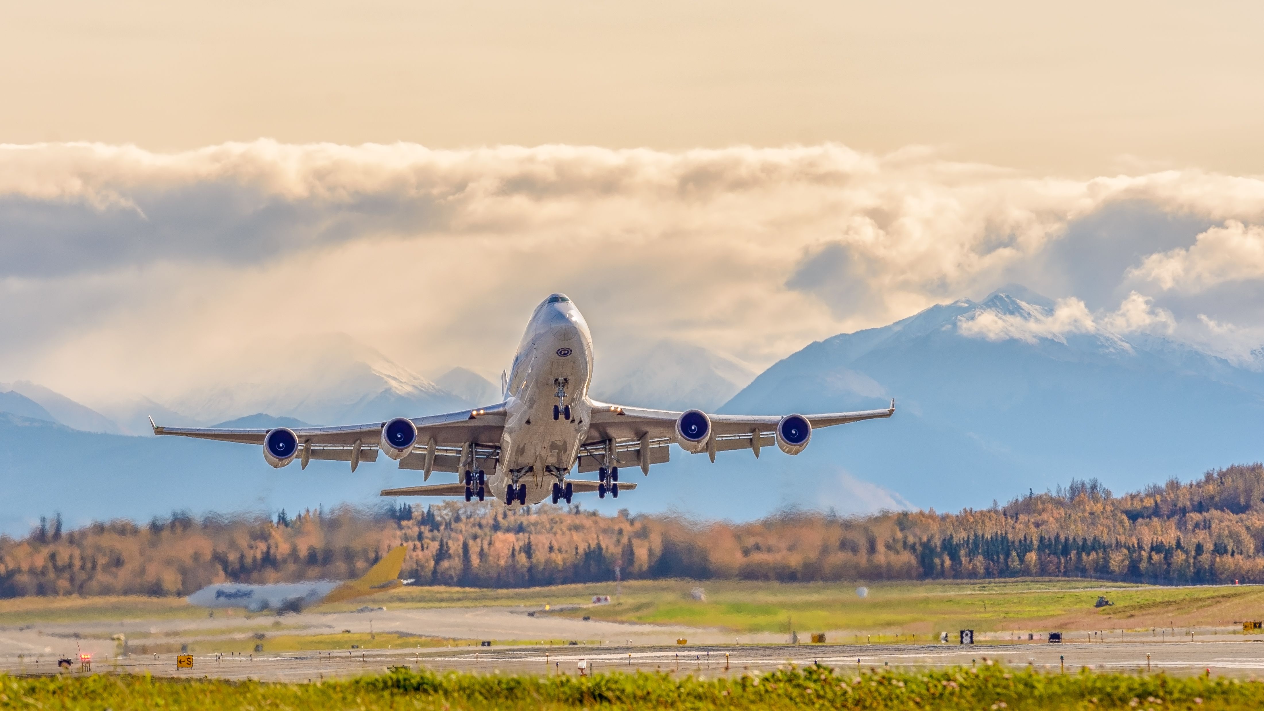 Boeing 747-400 (N450PA) - Standing near Northern Lights Boulevard at Ted Stevens International Airport as this Polar 747 took off.