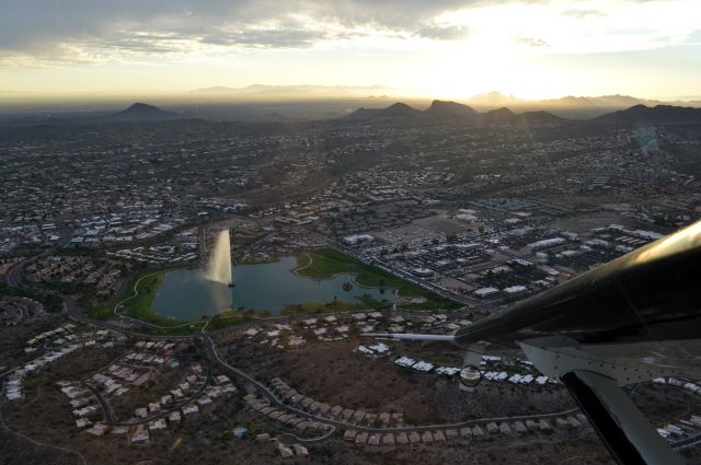 Cessna Caravan (N1229X) - Nice view of Fountain Hills minutes before sunset.