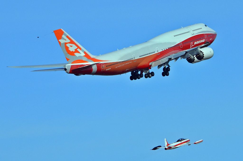 BOEING 747-8 (N6067E) - First flight with the Boeing chase plane close in trail.