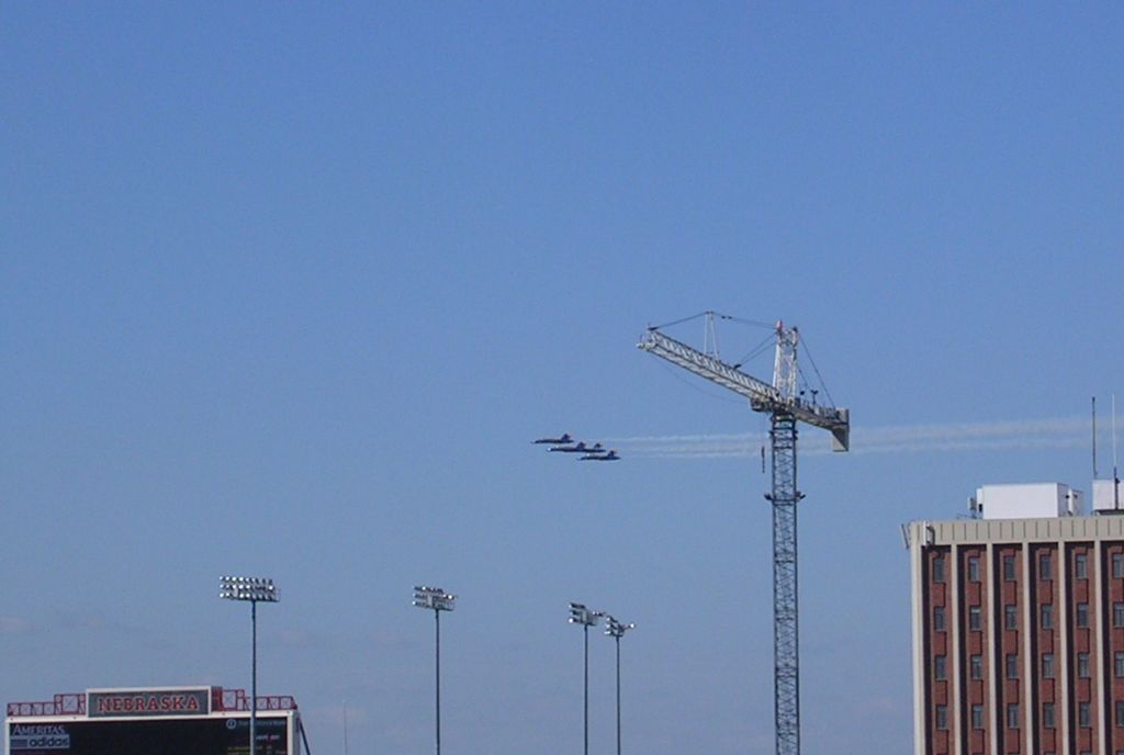 — — - 090811 Blue Angels practicing for weekend show, passing Husker hell
